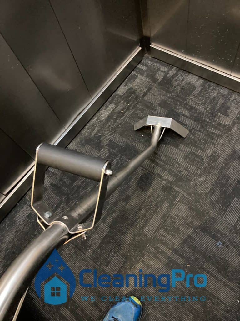 Cleaning carpet in a lift in auckland.